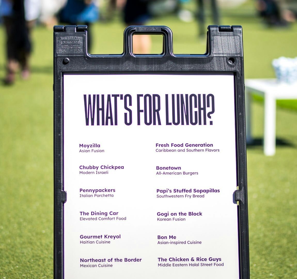 Sandwich board with a listing of menu items